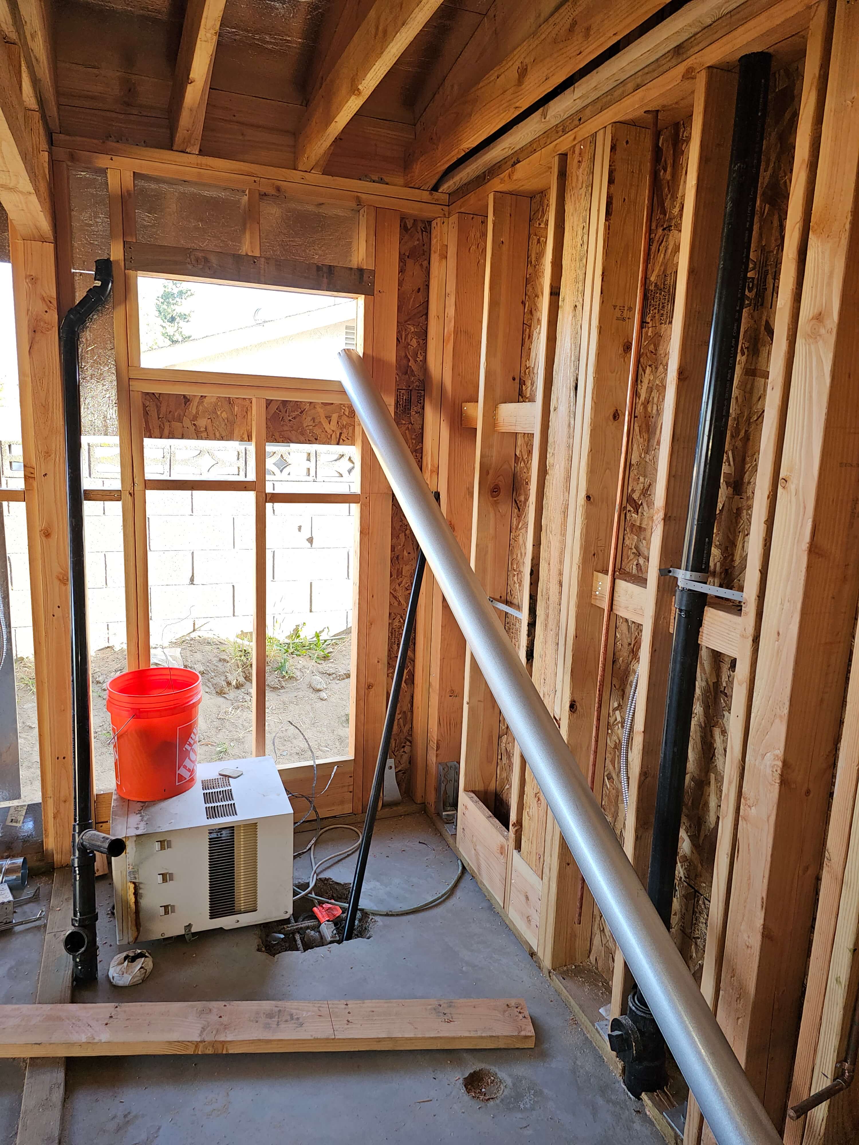 Ontario — rough-in framing with plumbing and ABS waste pipes