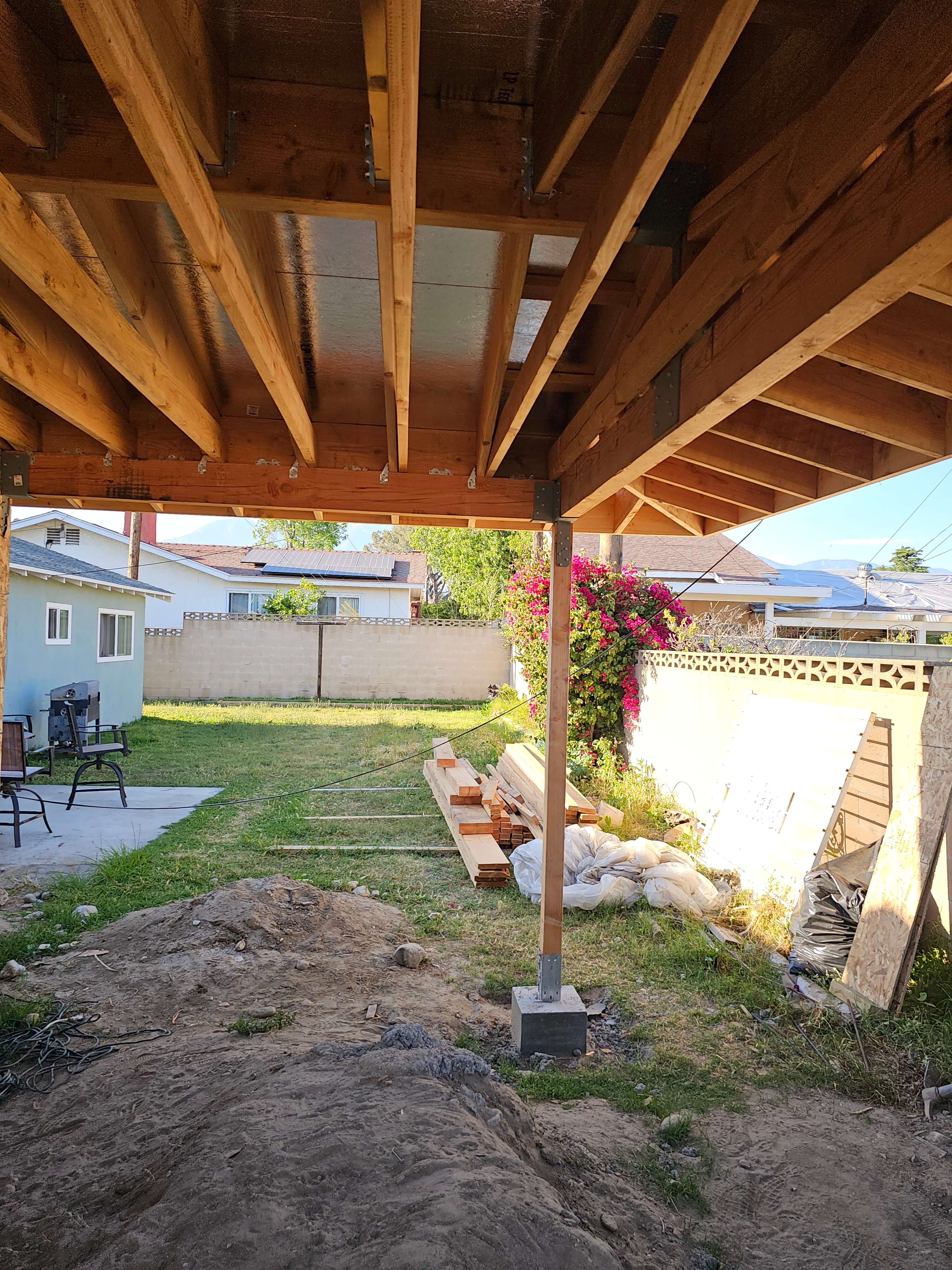 Ontario — patio roof framing with timber post on concrete pier