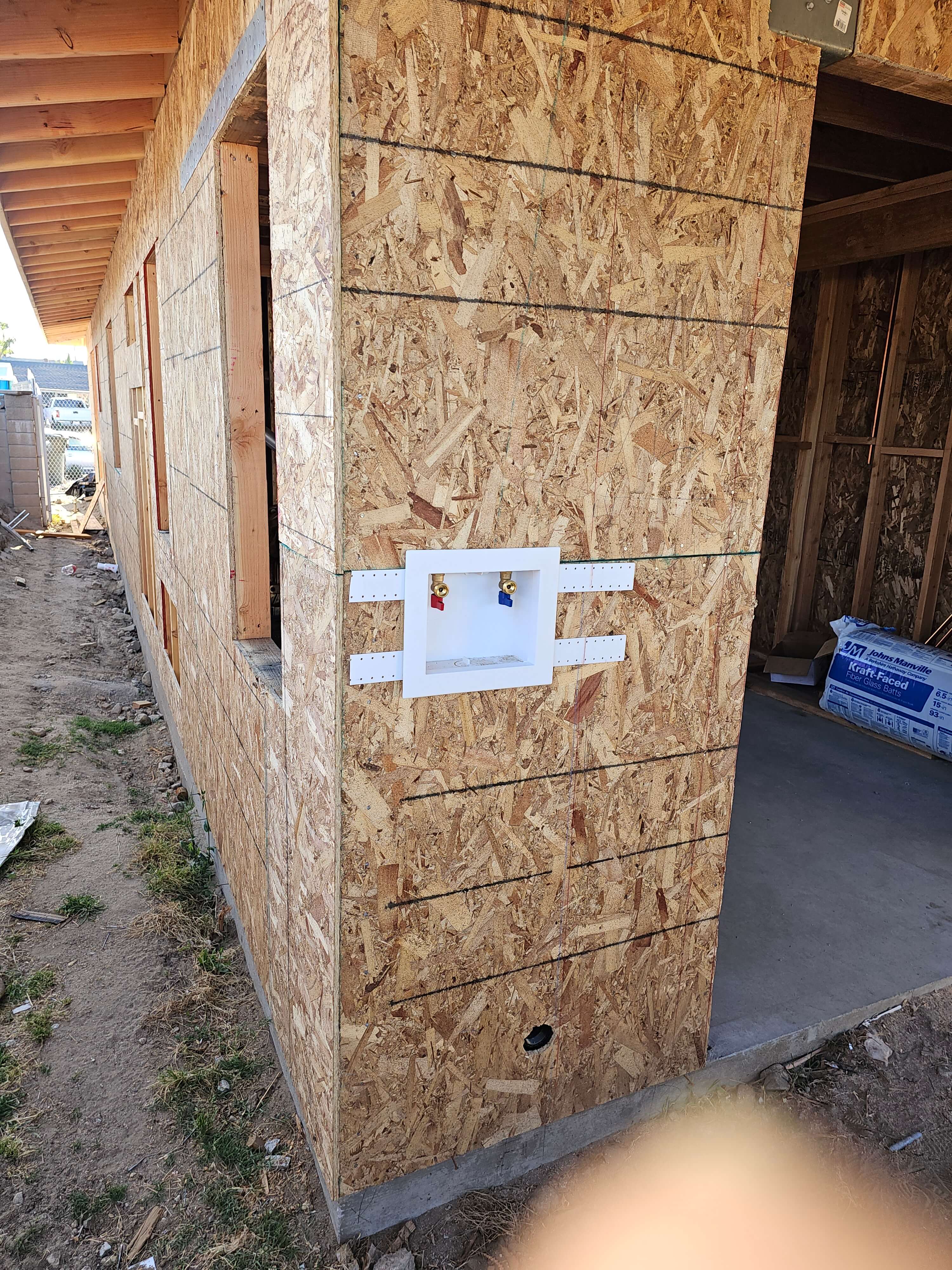 Ontario — washing machine outlet box on OSB sheathed exterior wall