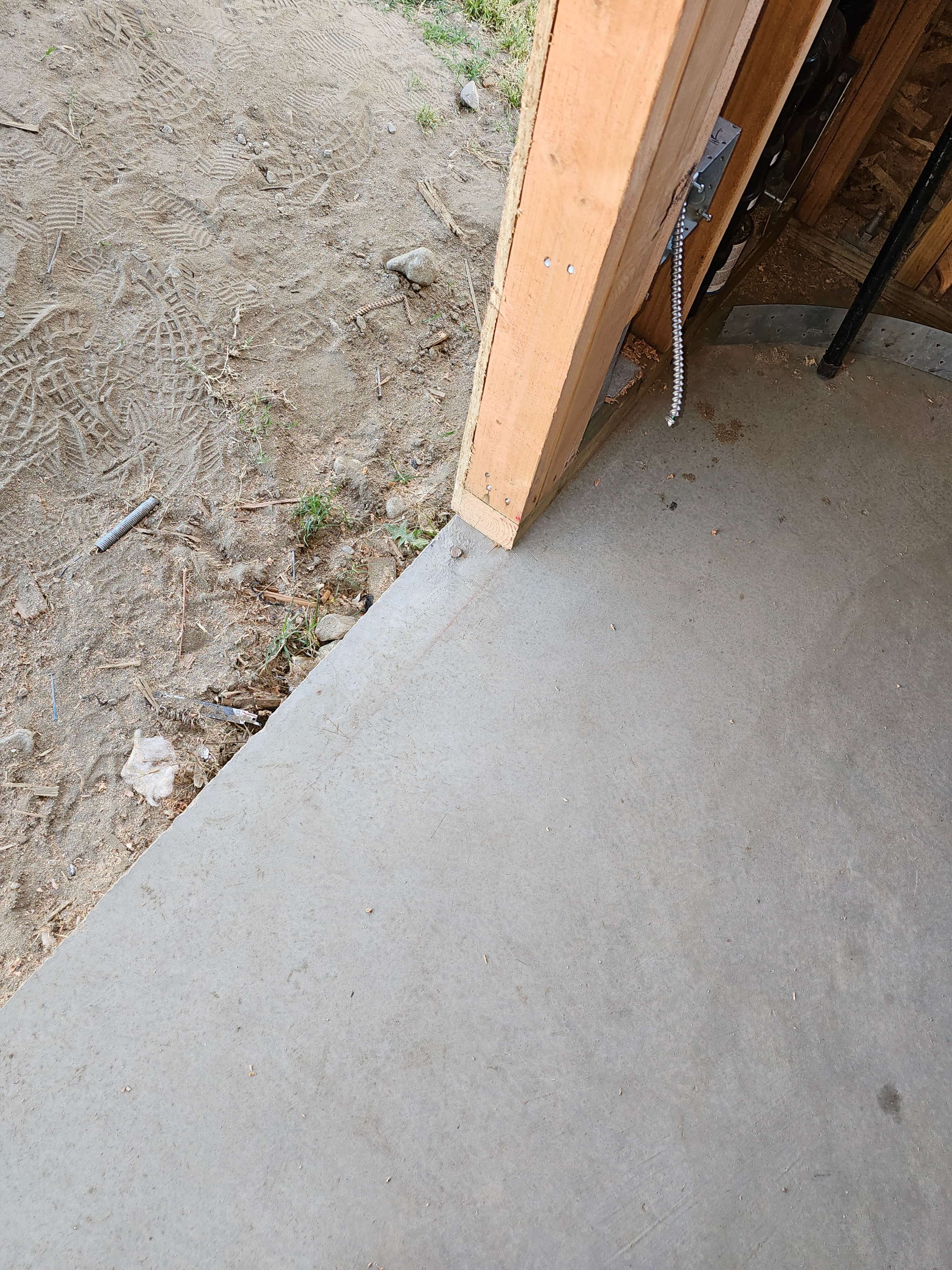 Pomona — garage door opening converted with new wood framing