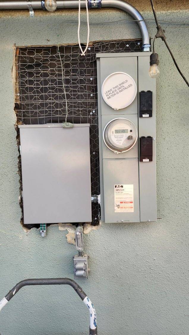 Ontario — upgraded Eaton electrical meter panel on stucco wall