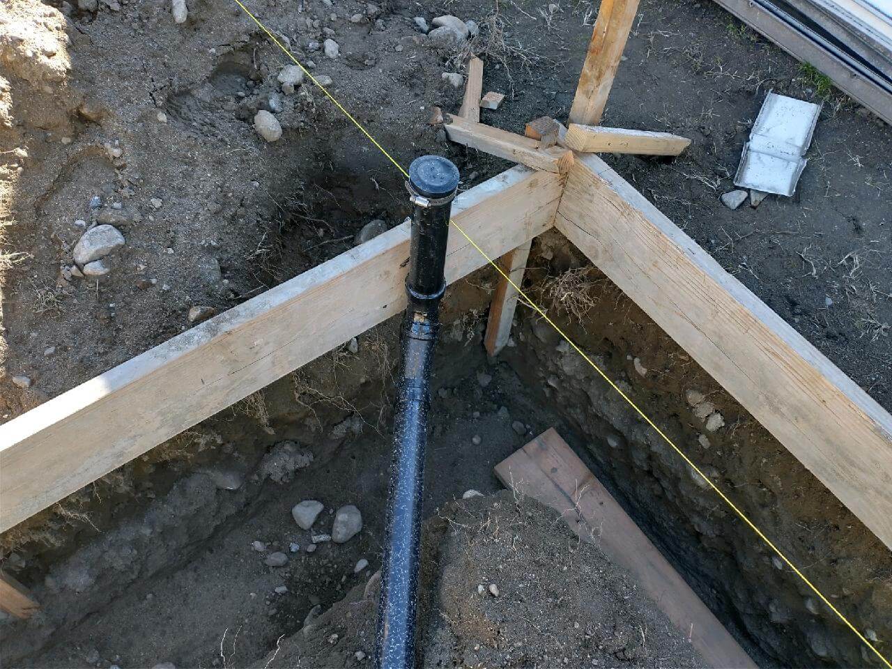 Ontario — ABS sewer cleanout pipe in concrete foundation forms