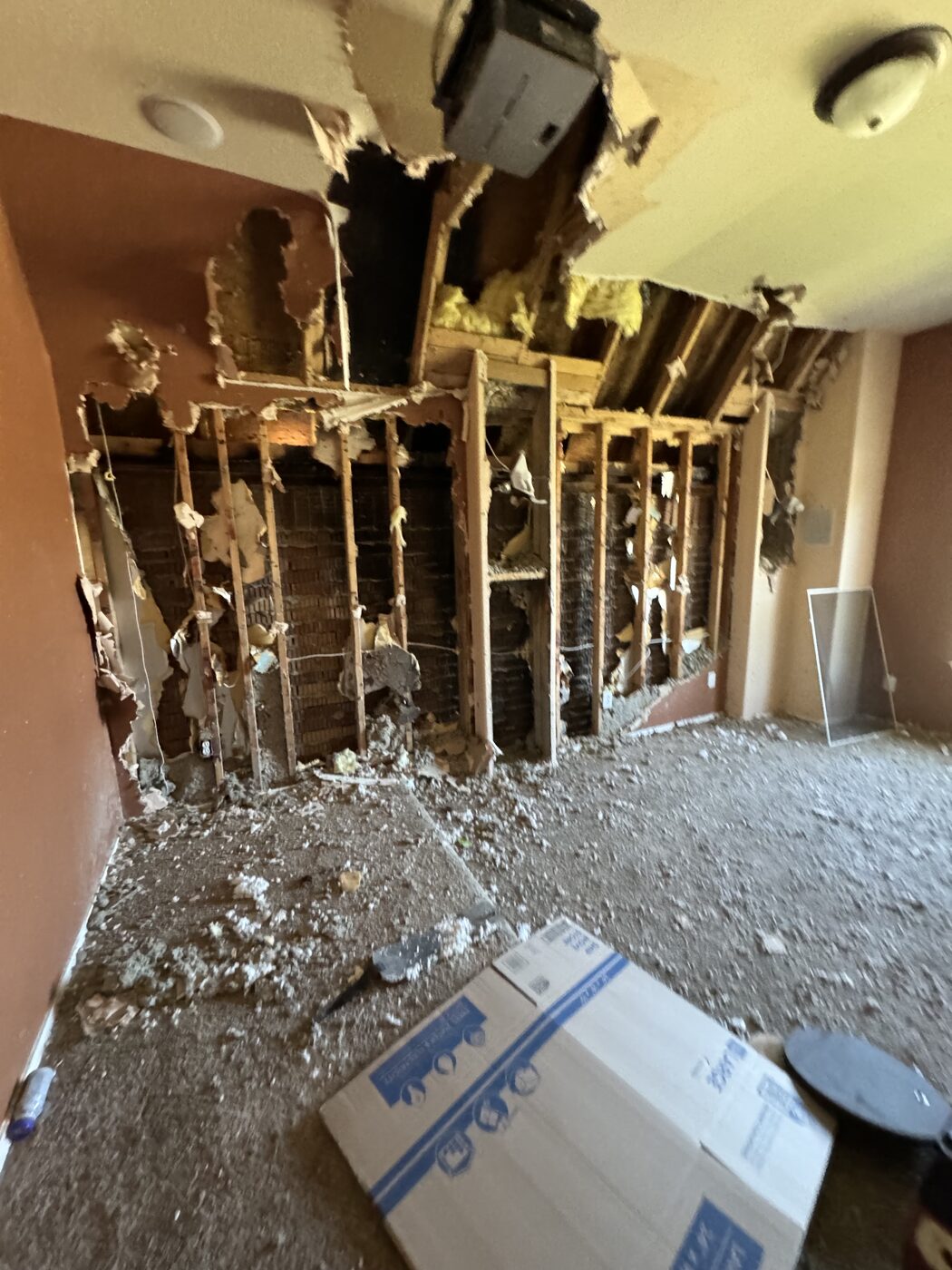 Fire-damaged room gutted to the framing in Burleson before reconstruction