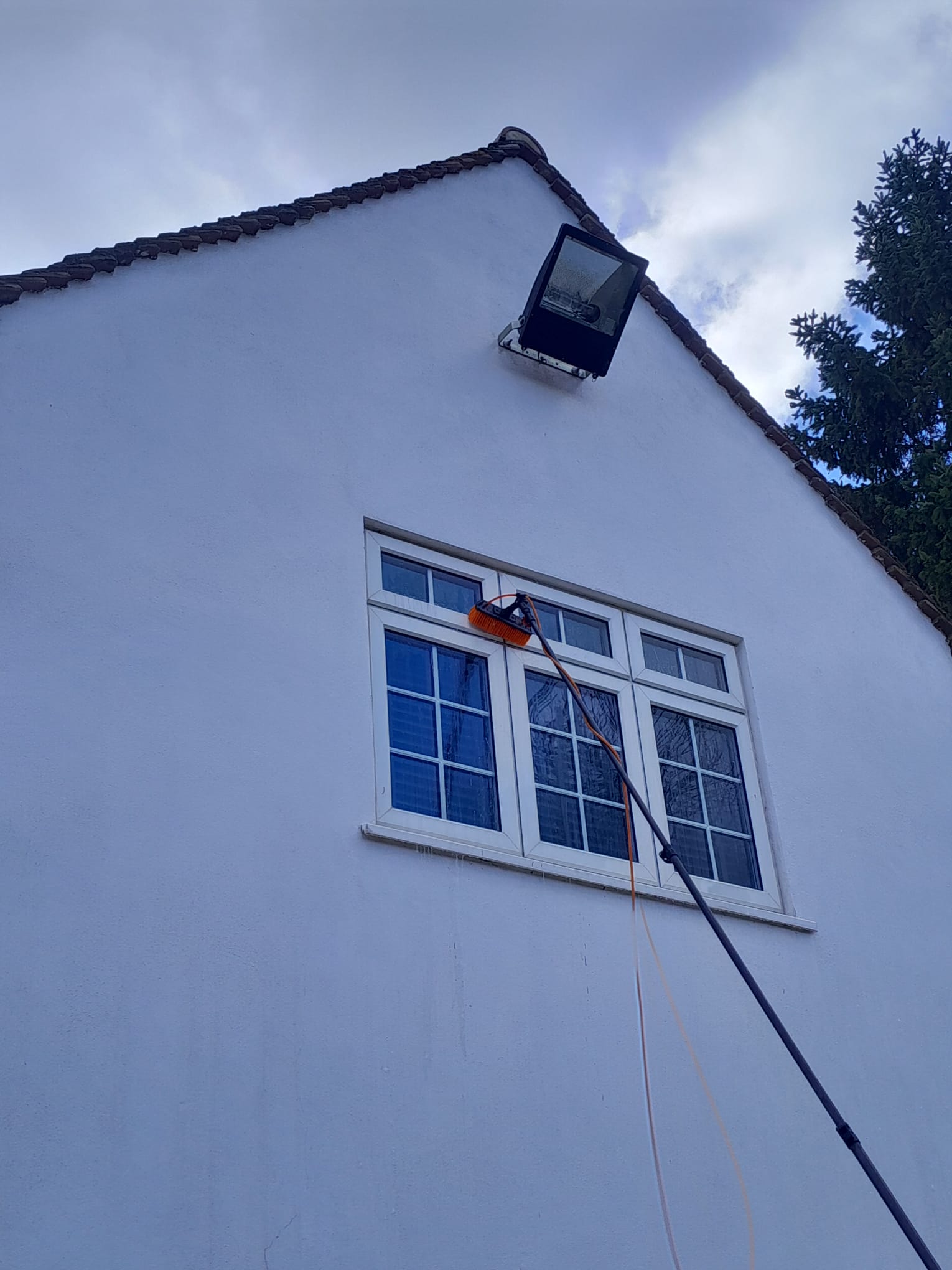 Exterior render restored after soft washing