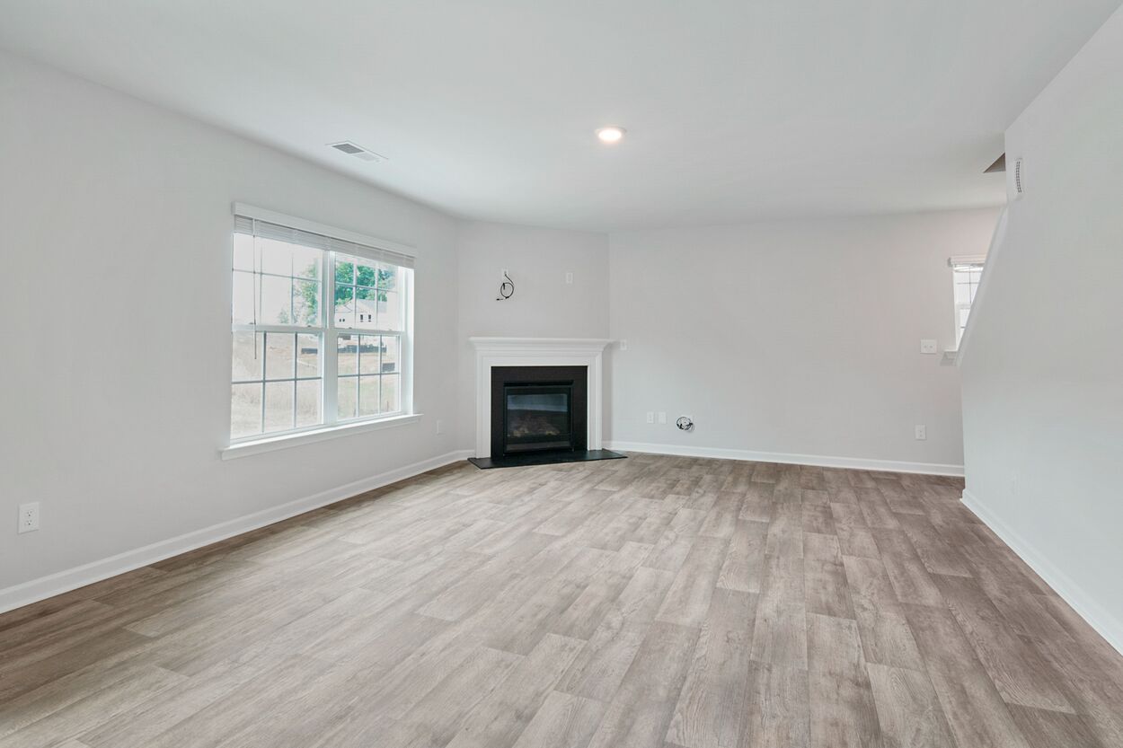 Newly installed vinyl plank flooring in a renovated Kanata, Ontario home