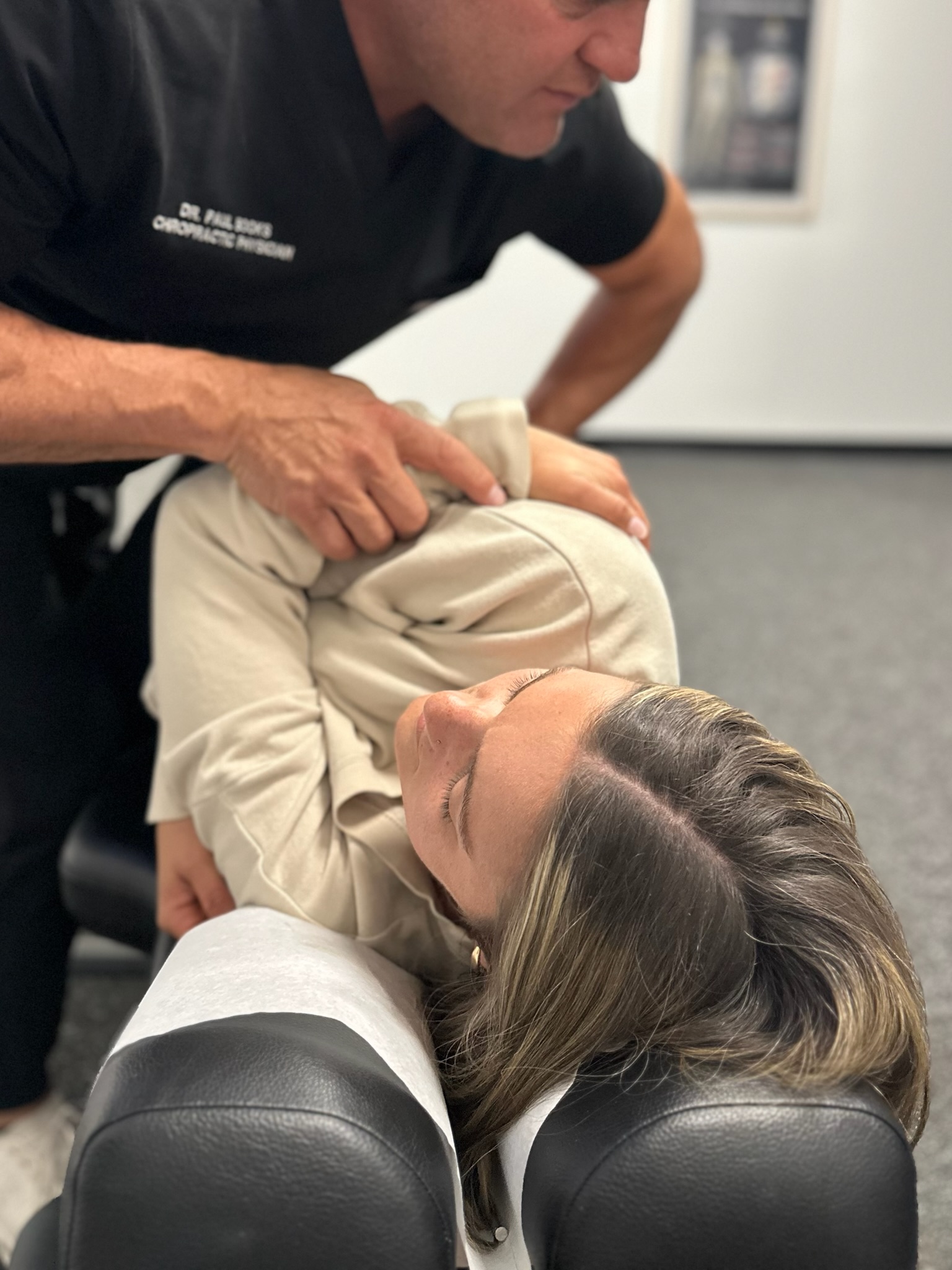 Dr. Paul Books, DC working with a Cincinnati Ben-Gal athlete