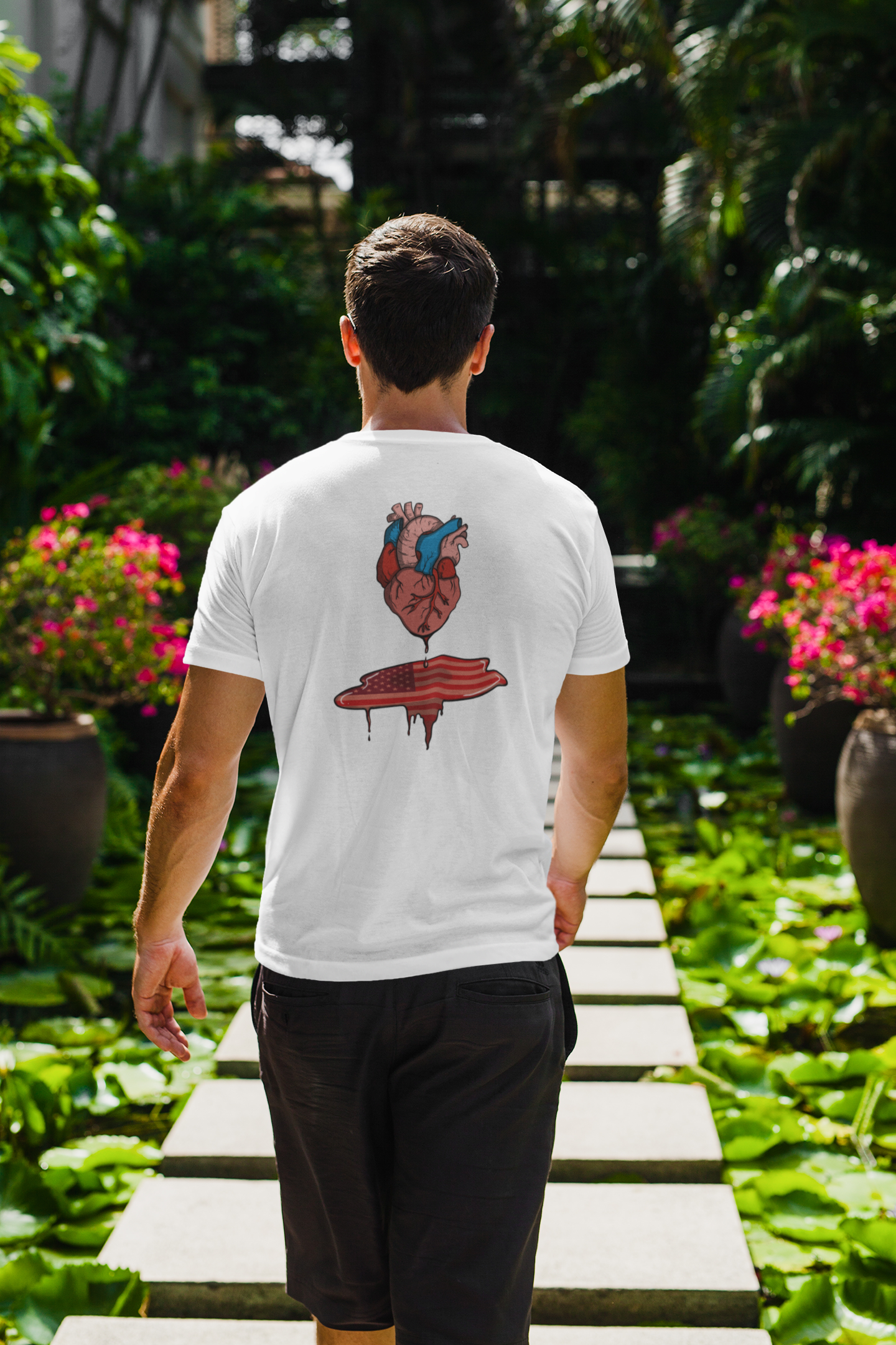 Man walking through a garden