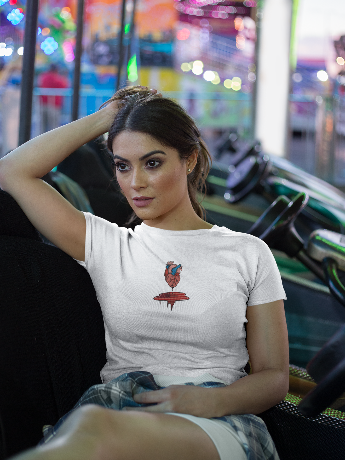Woman sitting in a bumber car