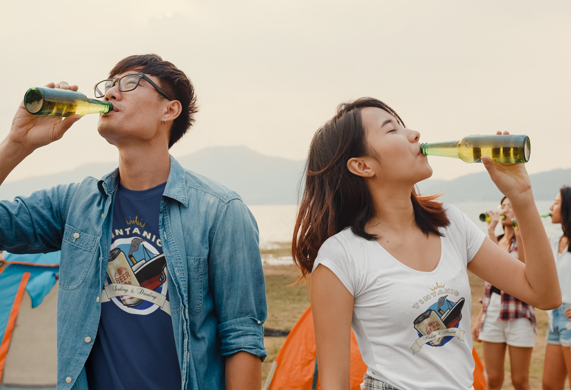 Man and a woman drinking beer on a beach
