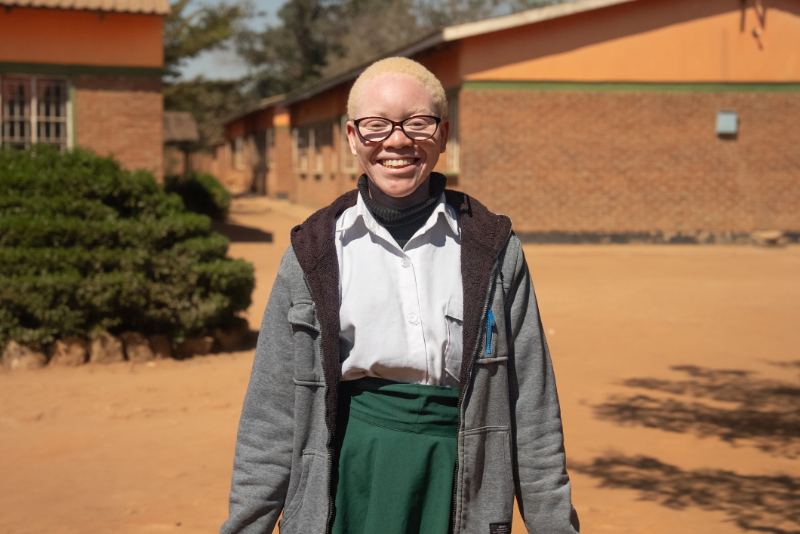 Schoolgirl smiling
