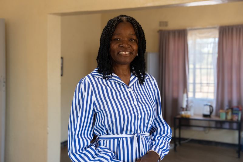 A woman smiling in an interview setup
