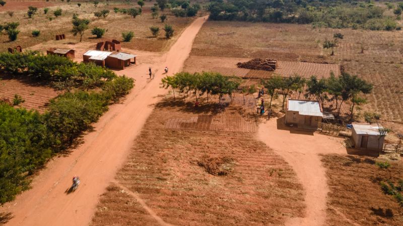 Paths crossing a village from above