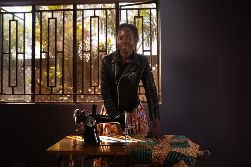 A woman at a sewing machine