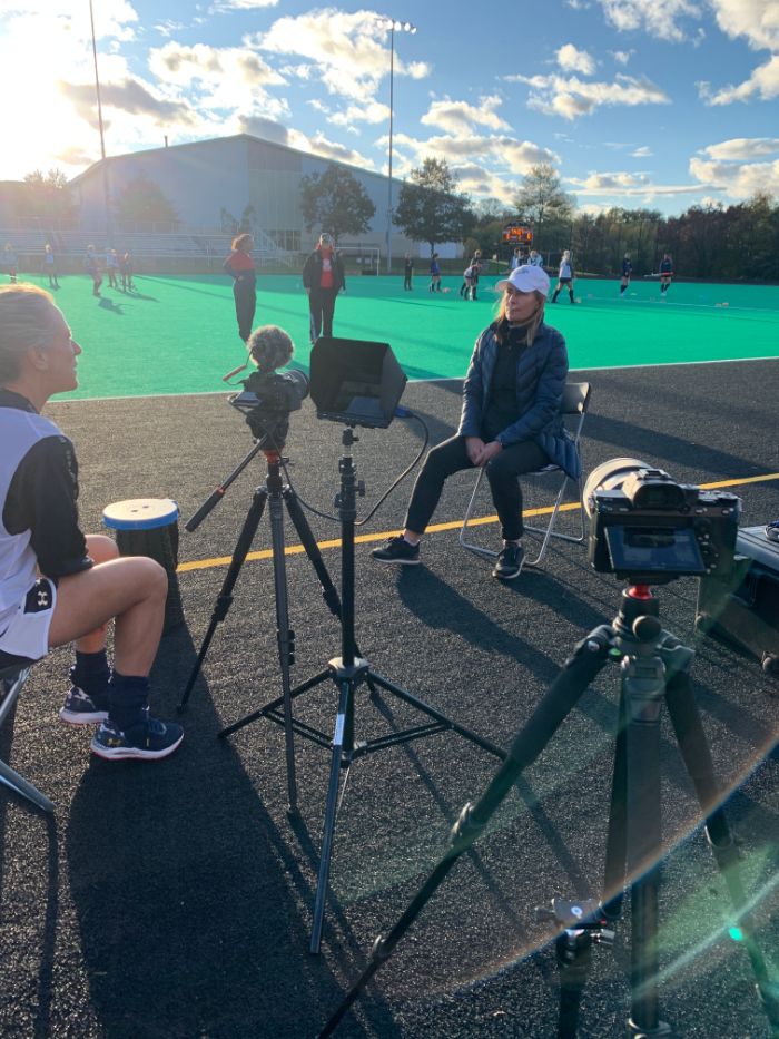 Multiple cameras set up for an outdoor field shoot