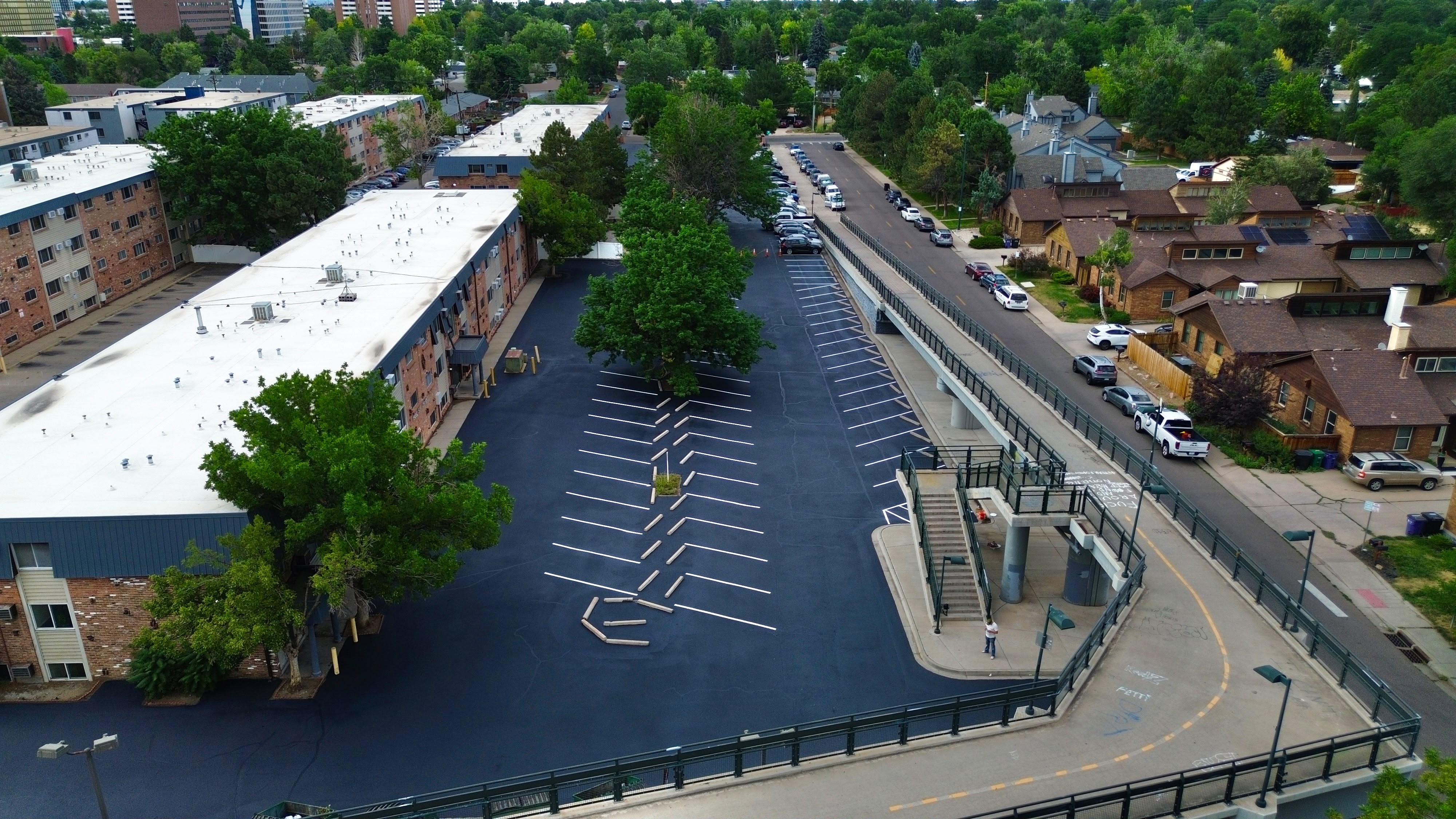 Apartment complex lot after sealcoat and restripe