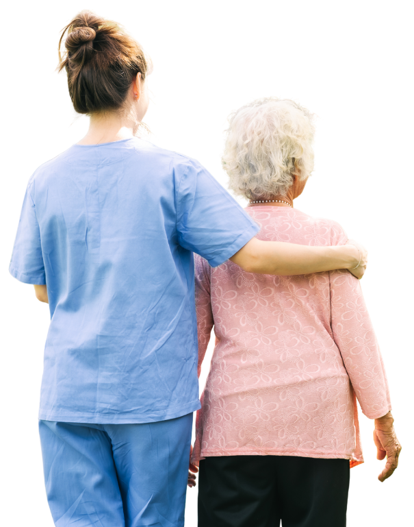 A nurse in scrubs walking arm in arm with an older woman