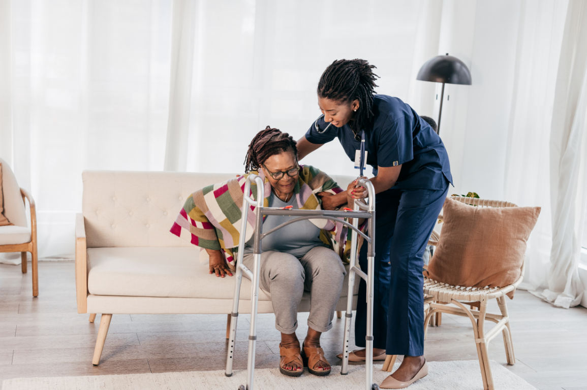 A clinician helping a patient with gentle exercises