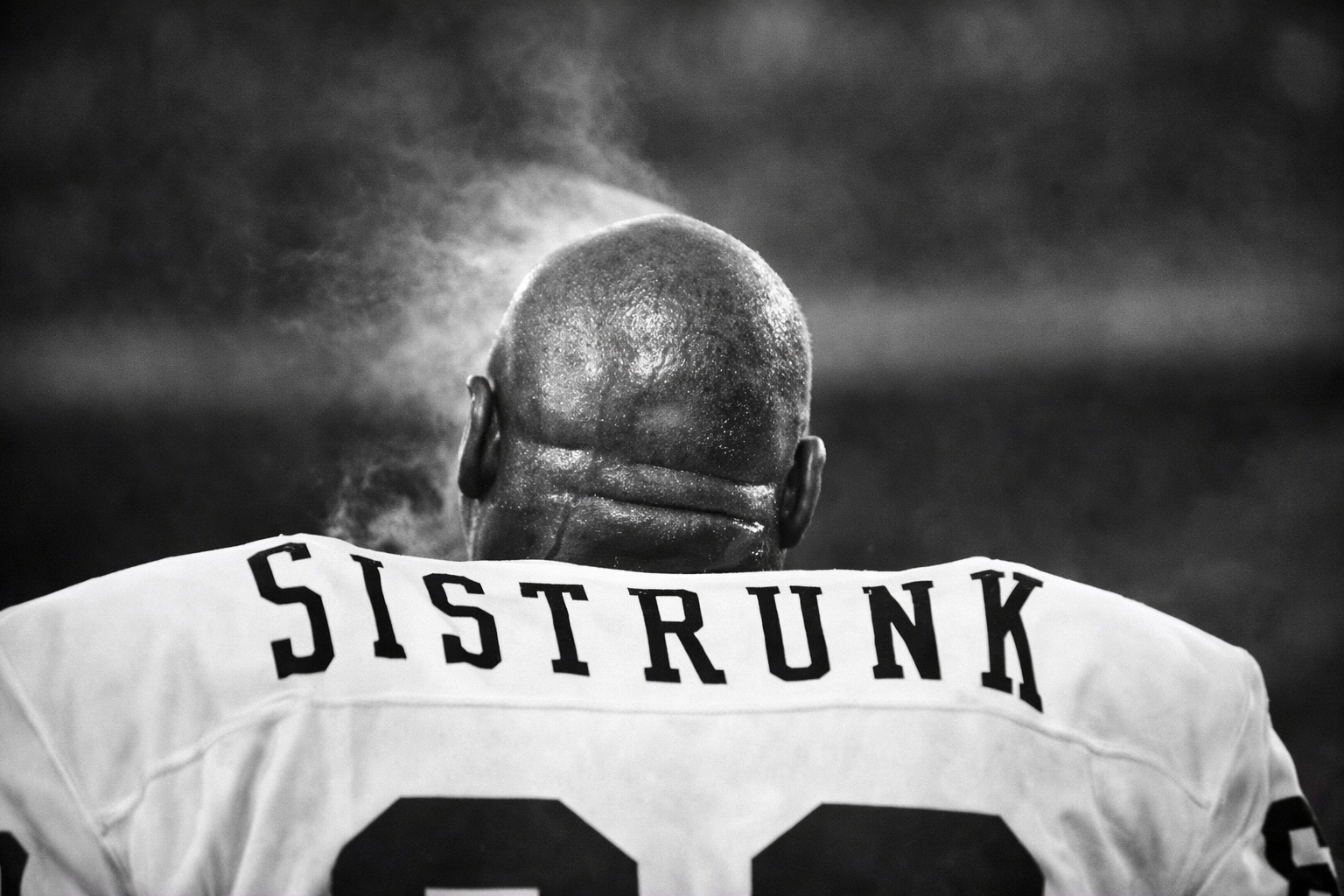 Otis Sistrunk on the sidelines in his Oakland Raiders jersey, captured in a moment of focus and intensity. Otis Sistrunk on the sidelines in his Oakland Raiders jersey, captured in a moment of focus and intensity.