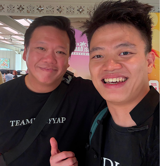 Kingsley Low with Eddy Yap smiling together