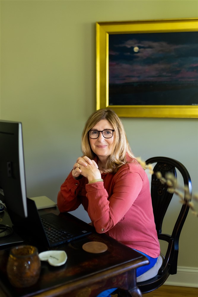 Tracy Doyle at her desk