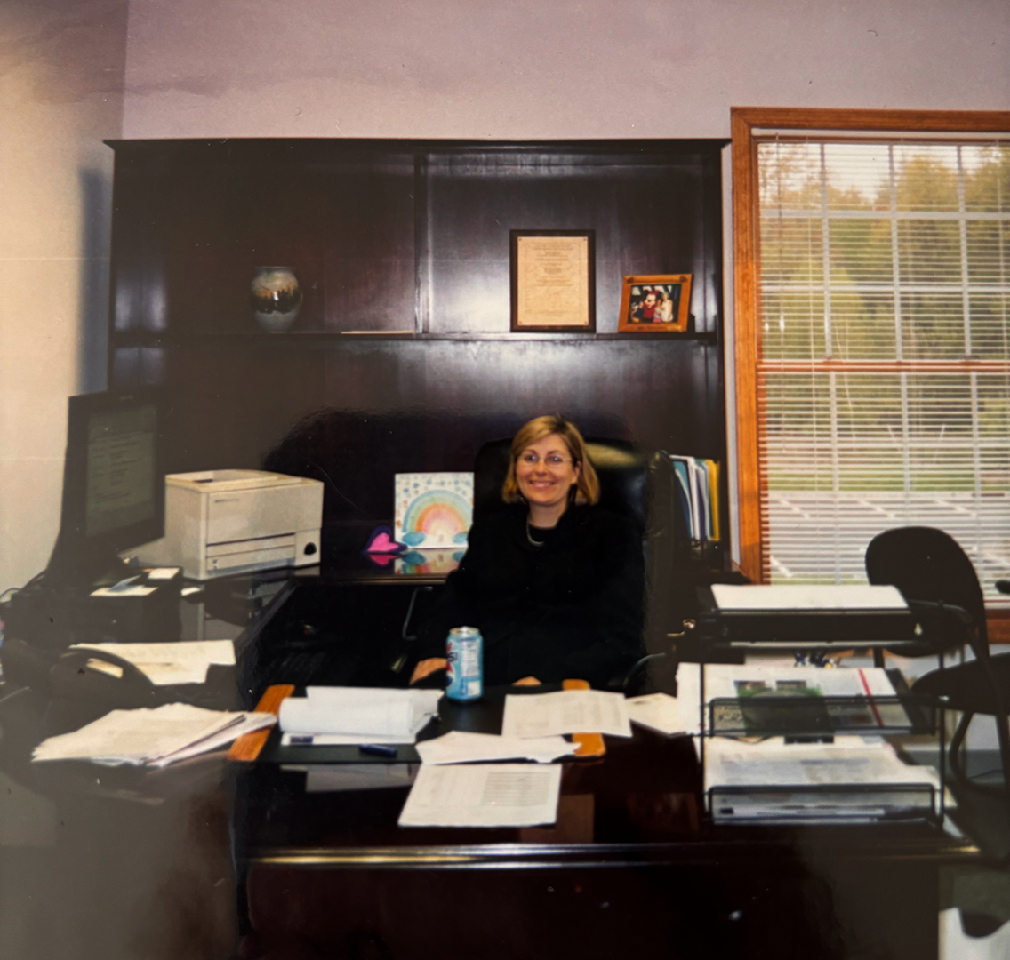Tracy in her first company office
