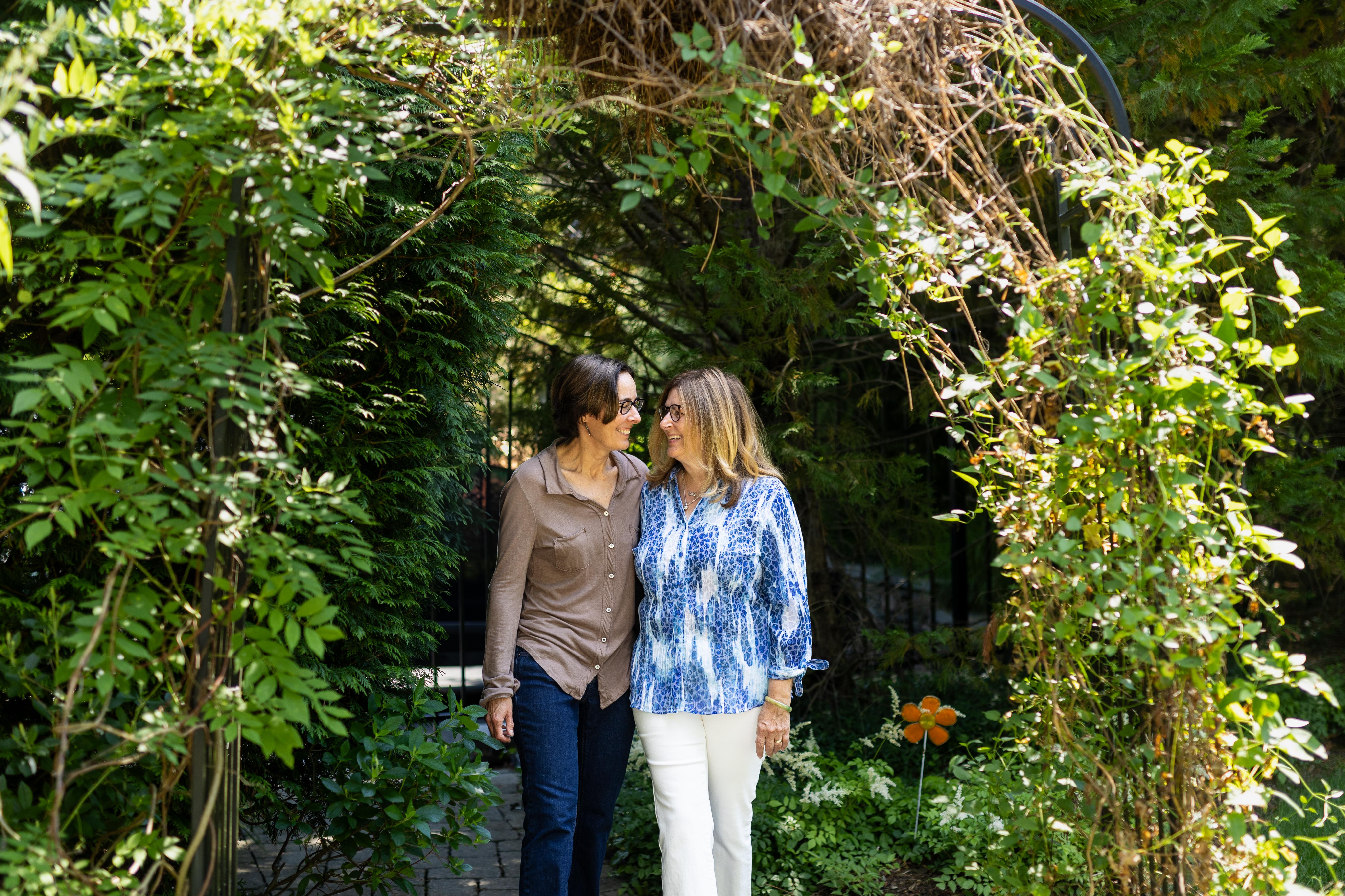 Tracy walking with Laurie outdoors