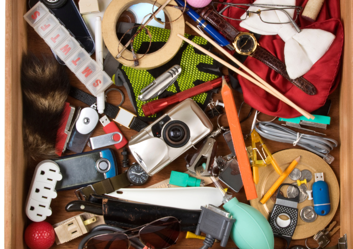 Looking at a junk drawer wondering why do I keep things I don’t need anymore