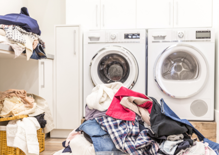 Why does my house never look perfect? Overflowing laundry in the laundry room.