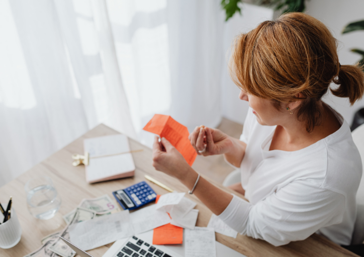 Woman making a few decisions at a time when letting go of stuff