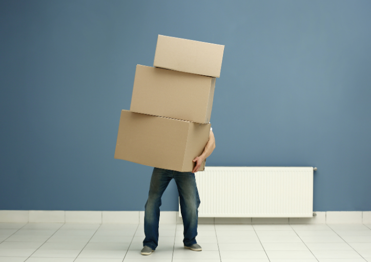 grief and clutter are heavy to carry like this man carrying heavy boxes grief and clutter are heavy to carry like this man carrying heavy boxes