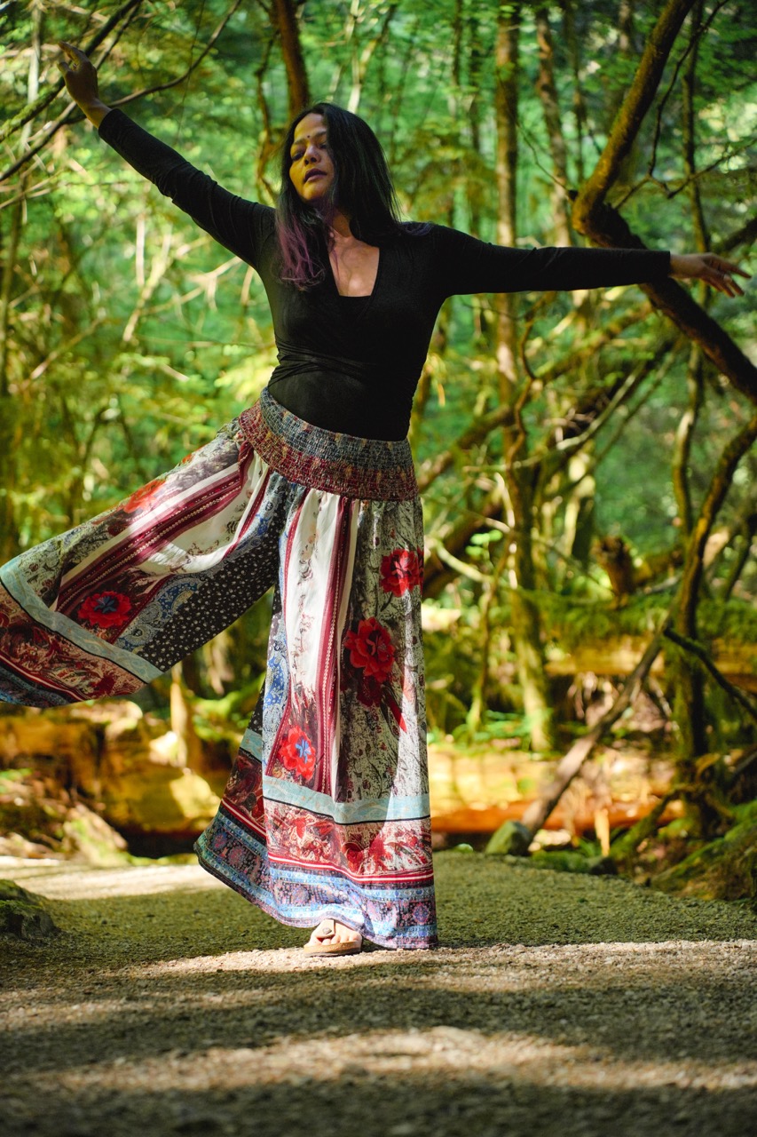 Vaishnavi practicing yoga outdoors