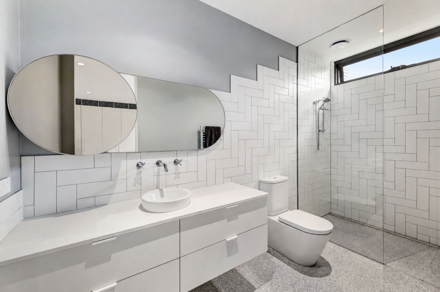 Full bathroom layout rework with modern renovation finishes