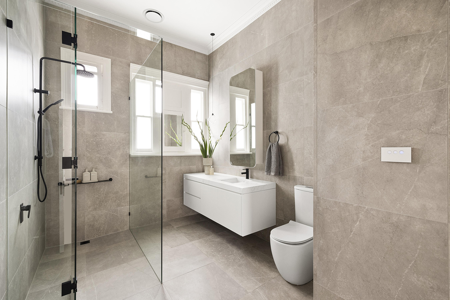 Ensuites bathroom with custom vanity and lighting