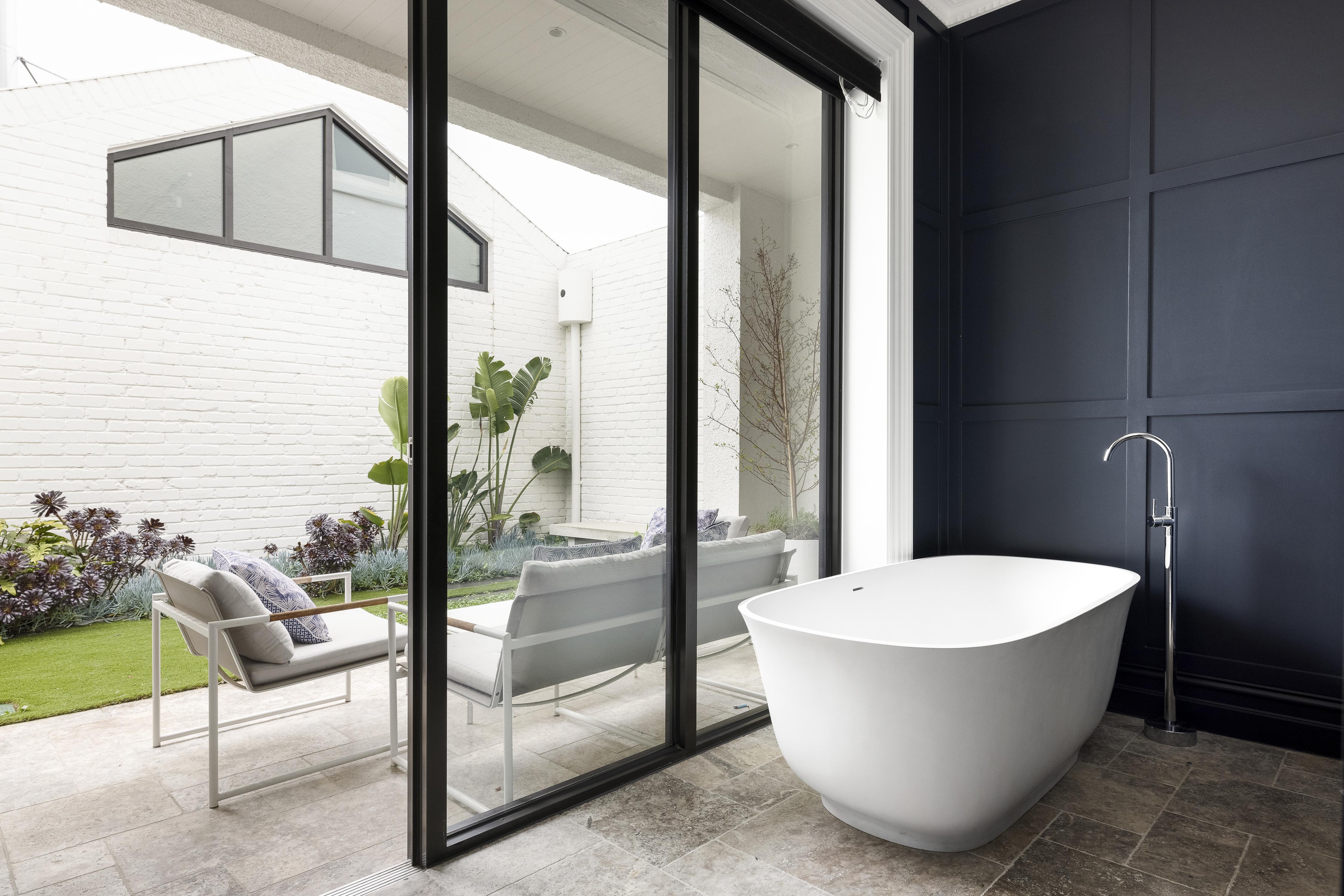 Bathroom layout redesign with premium materials and improved functionality
