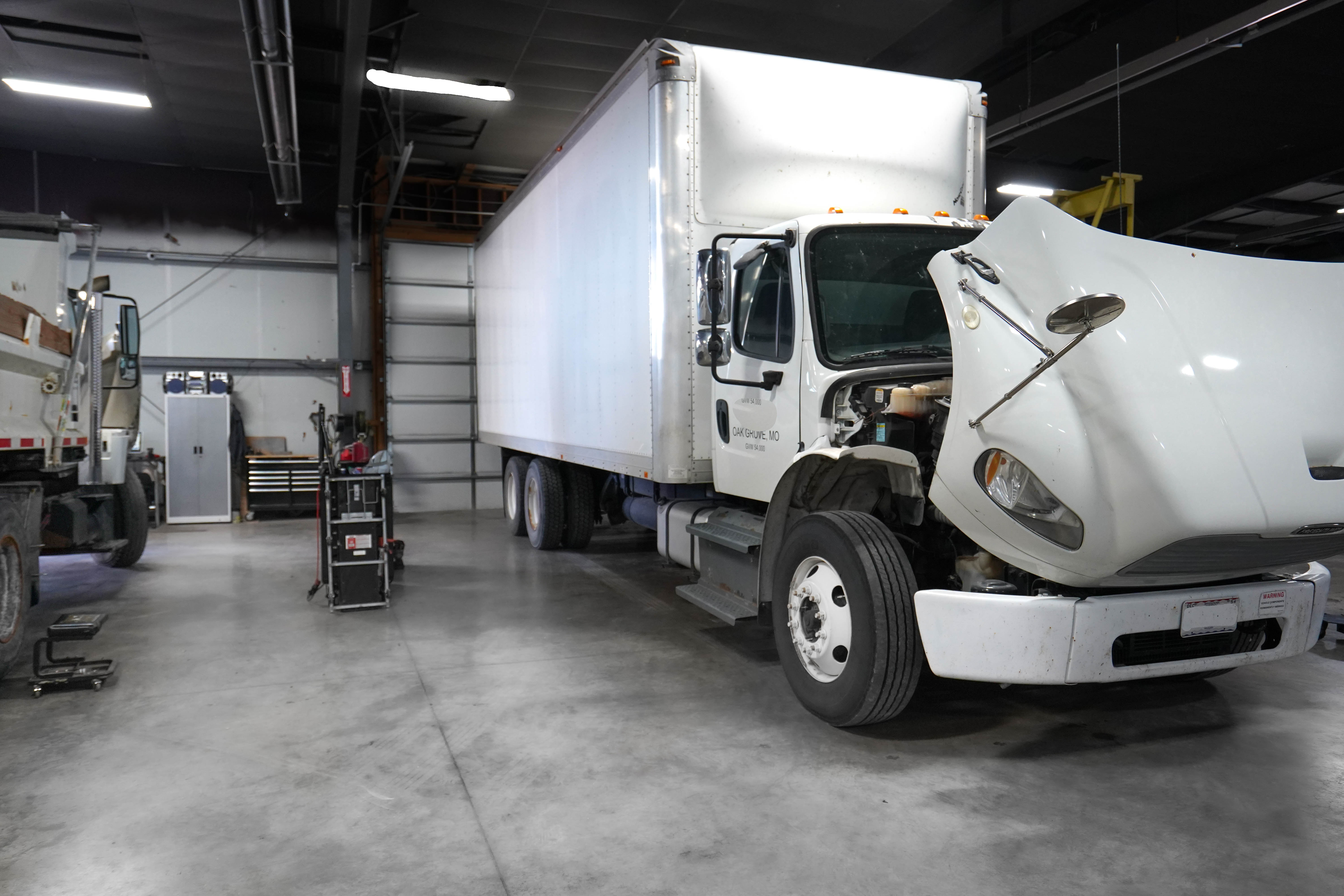 Custom truck graphics and DOT lettering at KC Wholesale Oak Grove