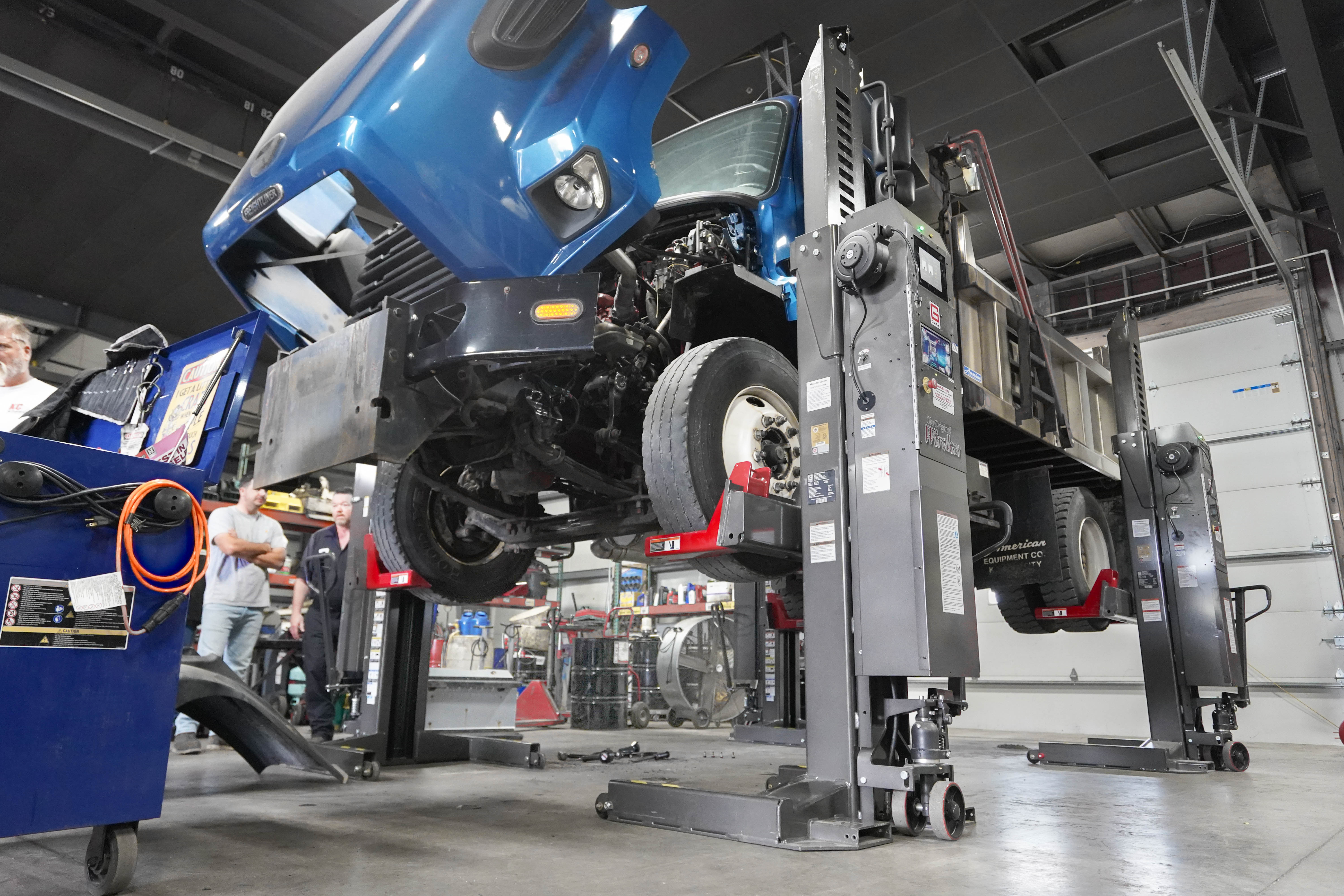 Commercial truck painting and fleet color match at KC Wholesale