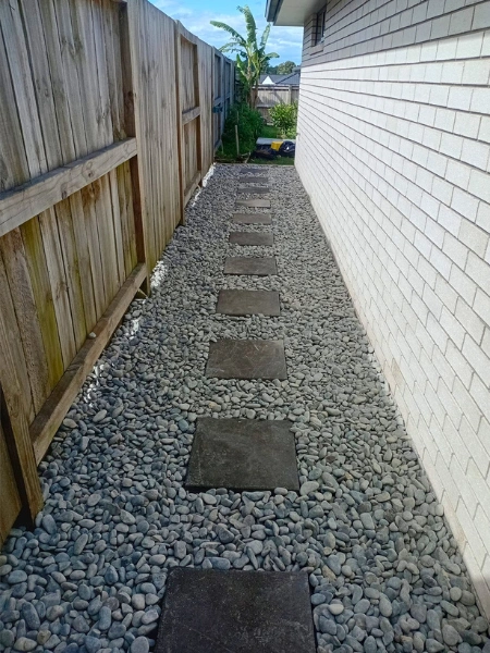 Paved courtyard with landscaping in Hamilton