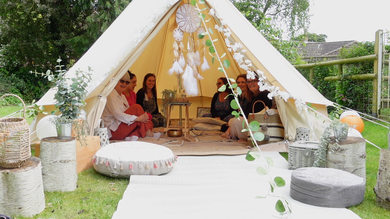 A BreathHealing Release group gathered in the bell tent