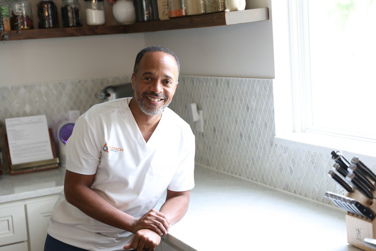 Dr. Jude A. Pierre standing