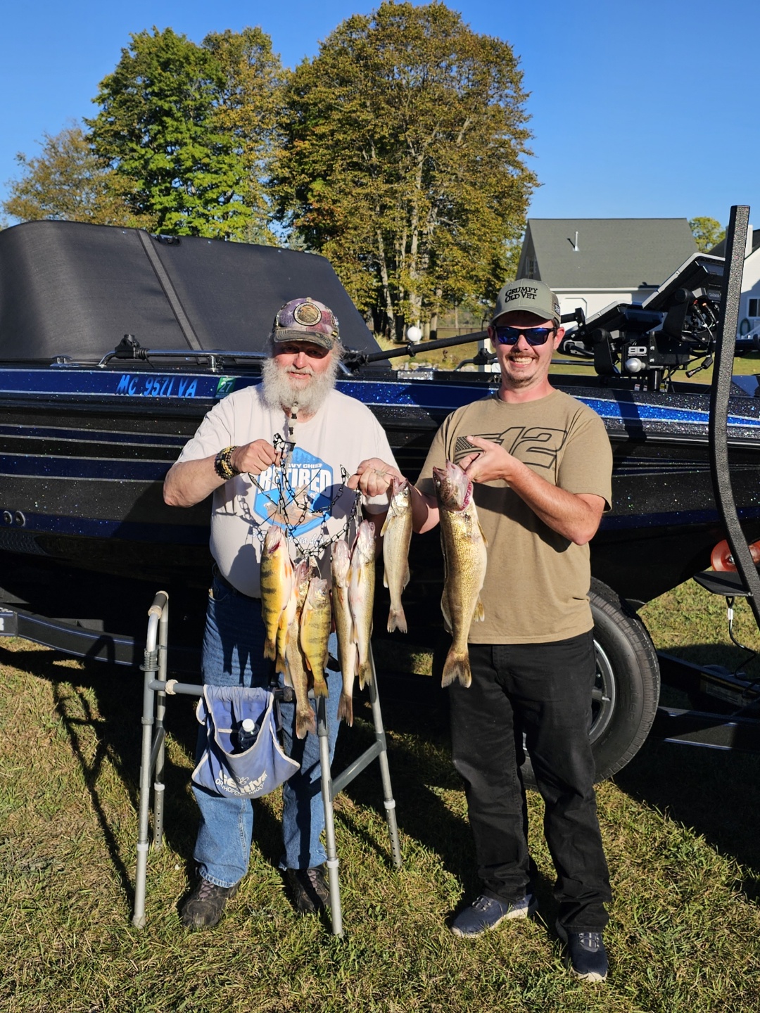 A veteran and Curt loading gear onto the boat before a charter