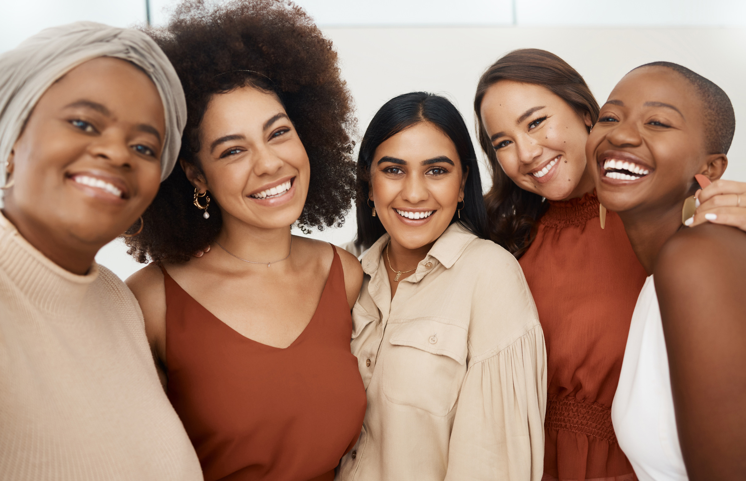 A group of women smiling A group of women smiling
