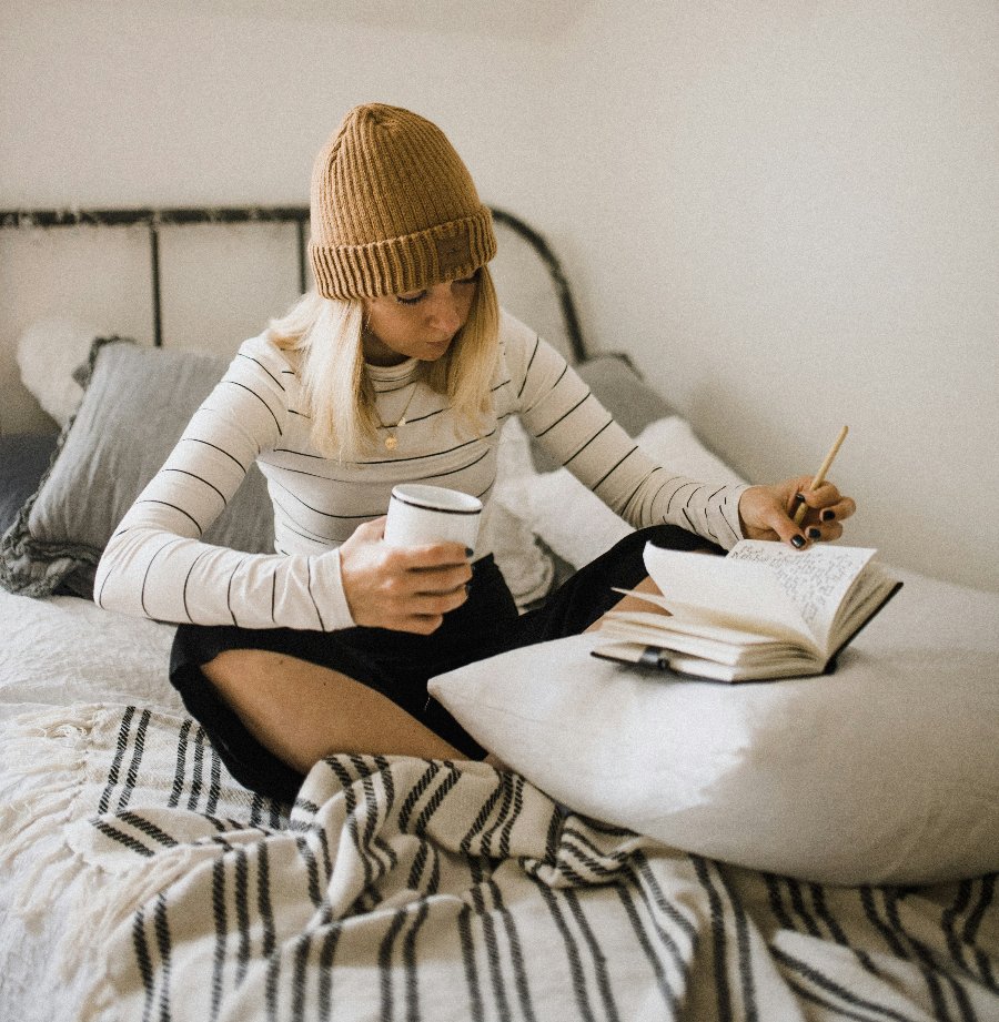 A woman writing her book