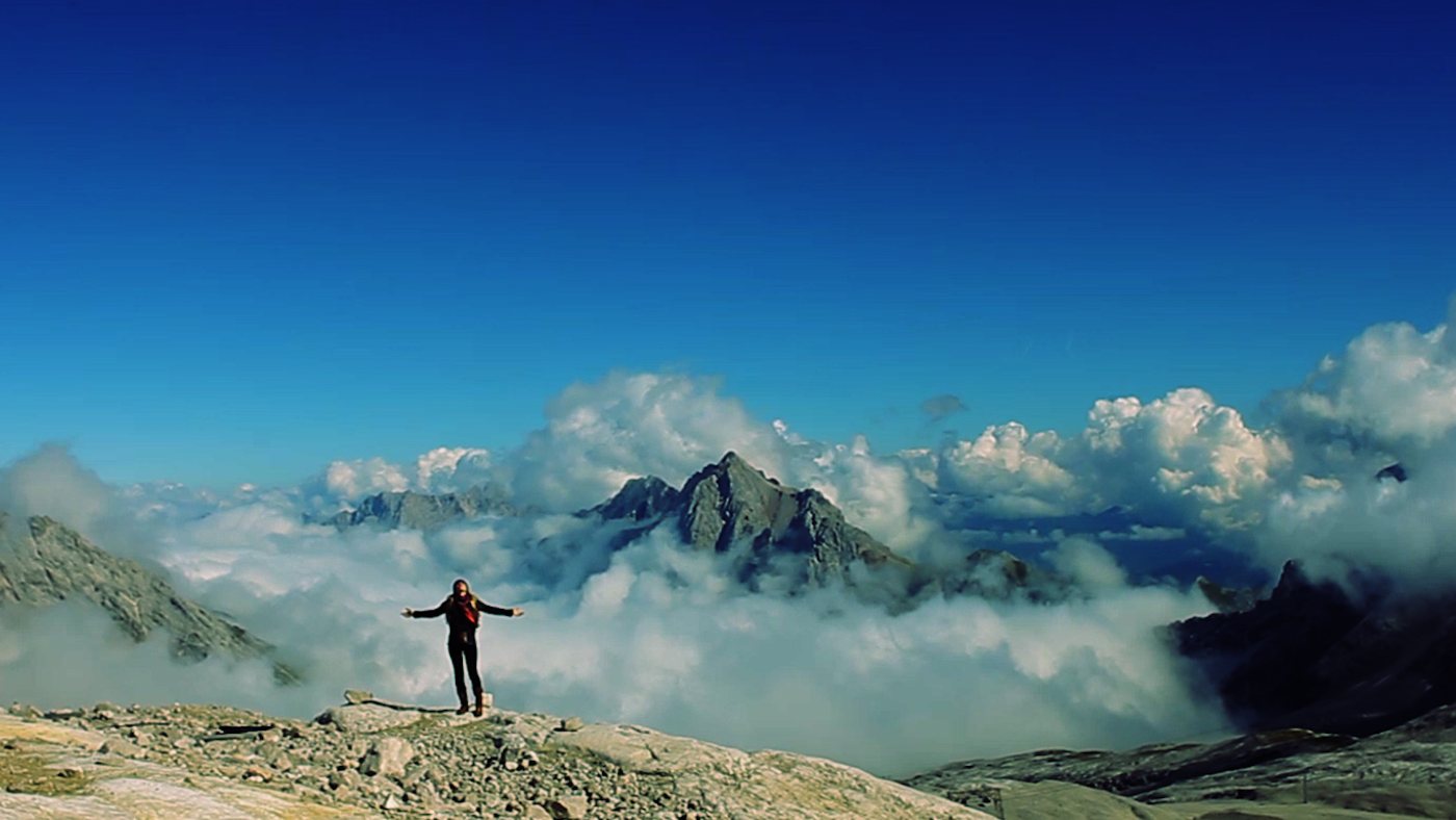 Arms open on the mountain where she found Jesus