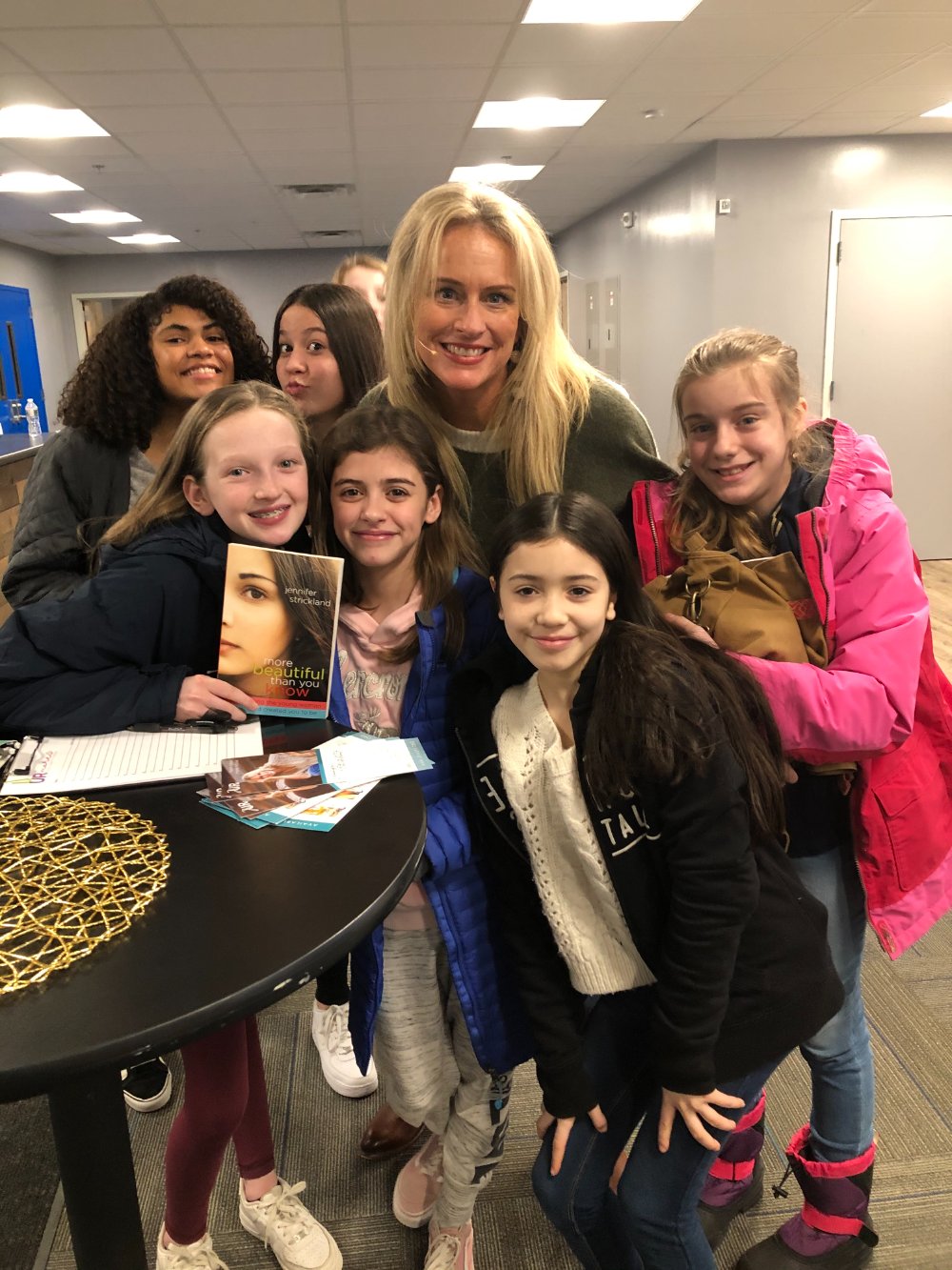 Jennifer with young women after an event