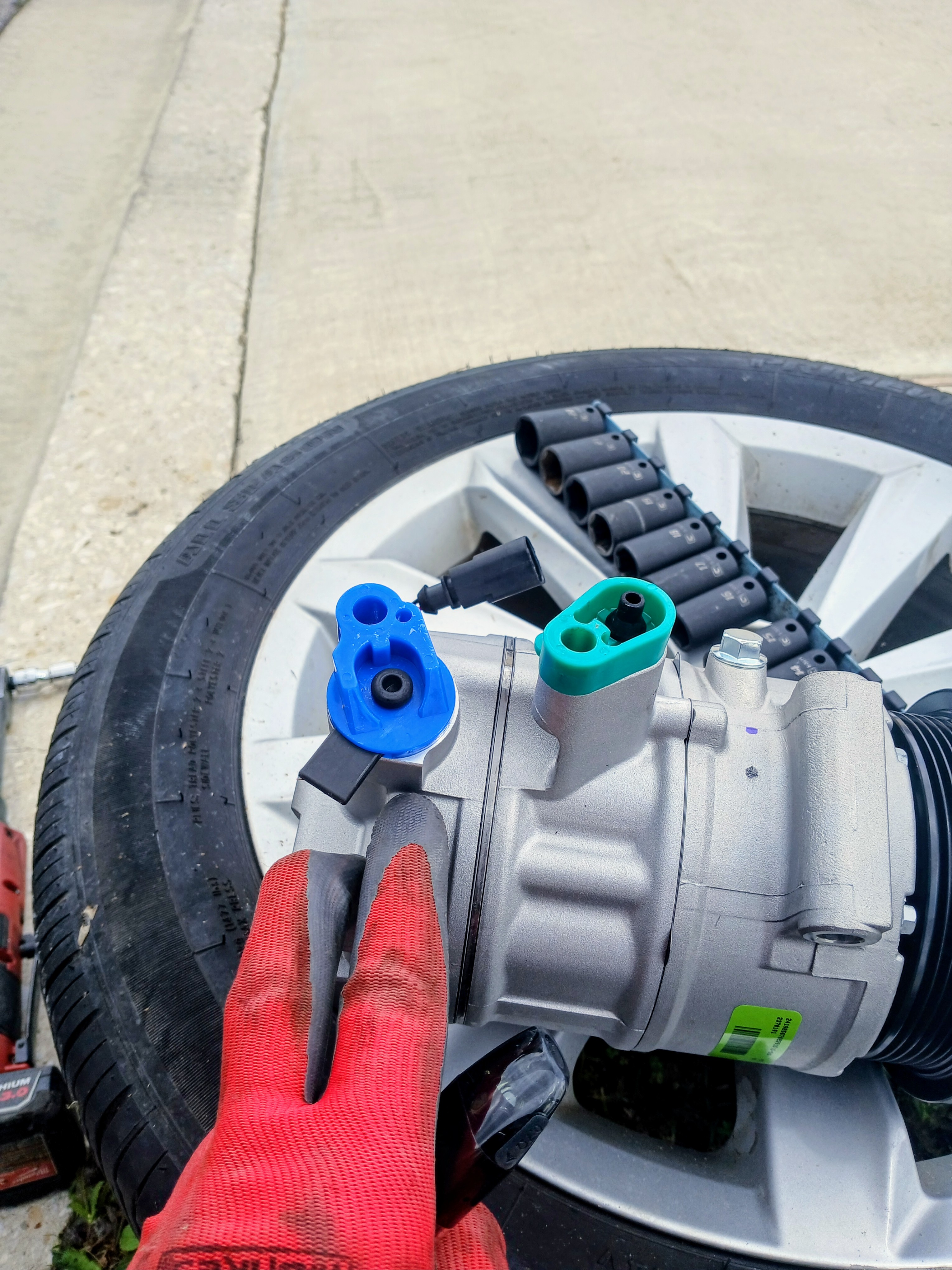 New AC compressor being installed on-site by Honest Joe's Auto mobile mechanic in Bastrop County, TX