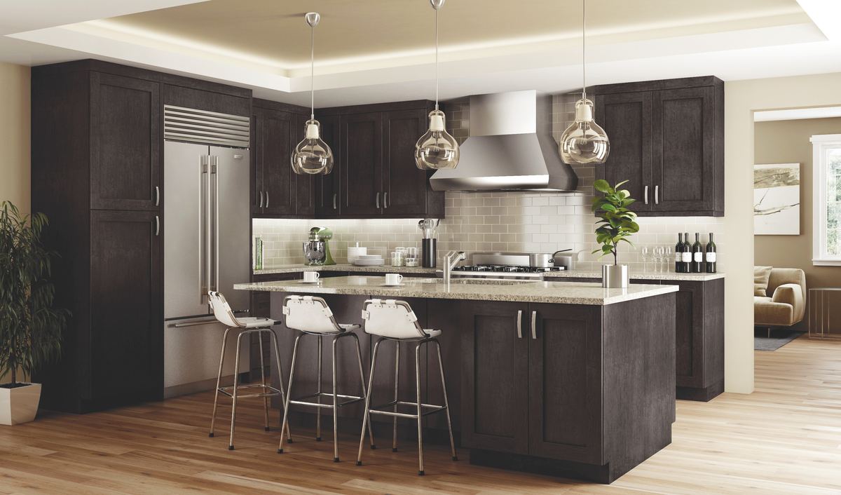 Dark grey shaker kitchen with an island, glass pendant lights and a stainless hood