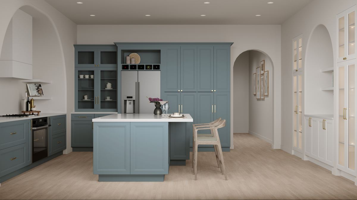 Kitchen with blue cabinets, a blue island and white arched niches