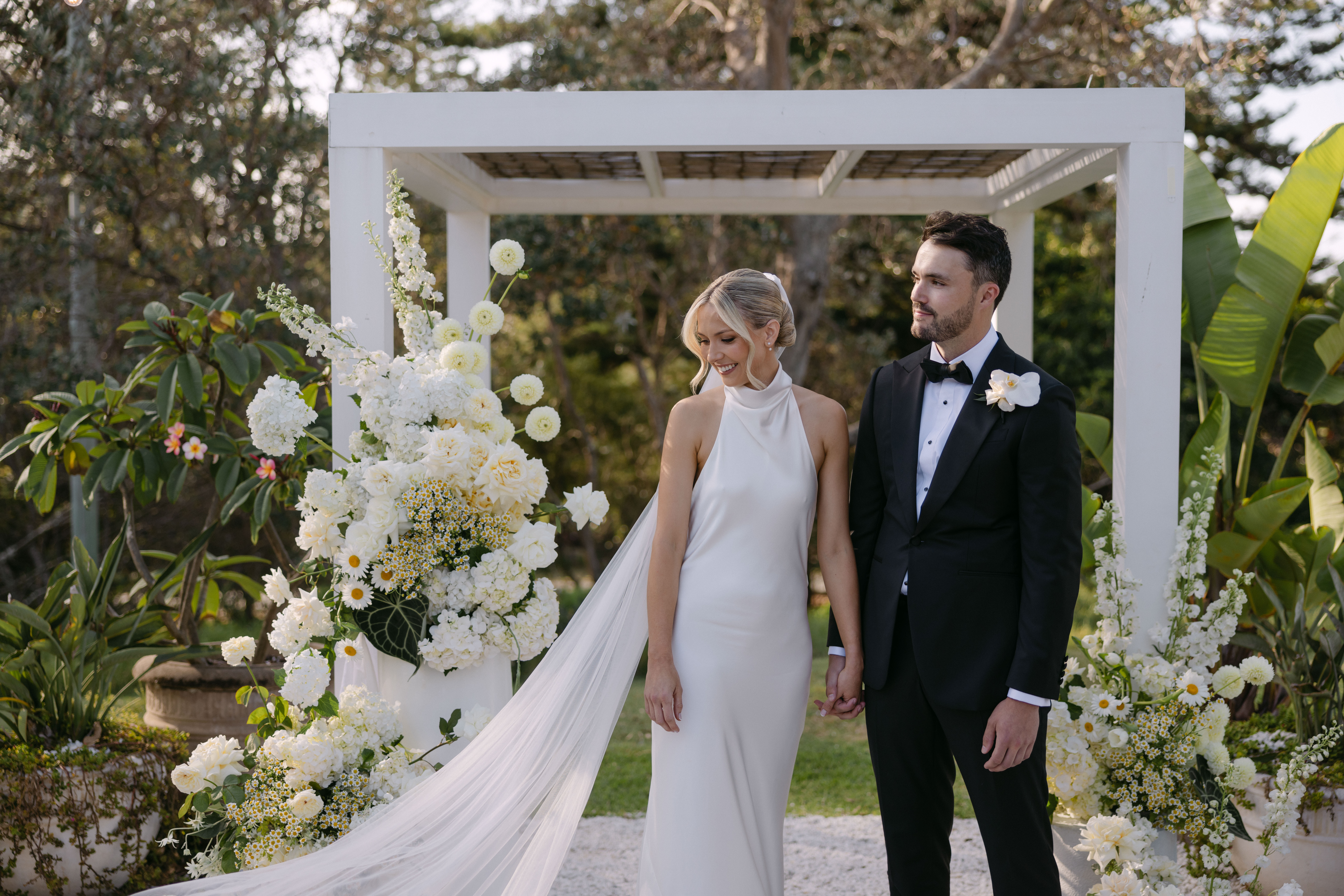 Ceremony arbour flowers by Solasta Blooms