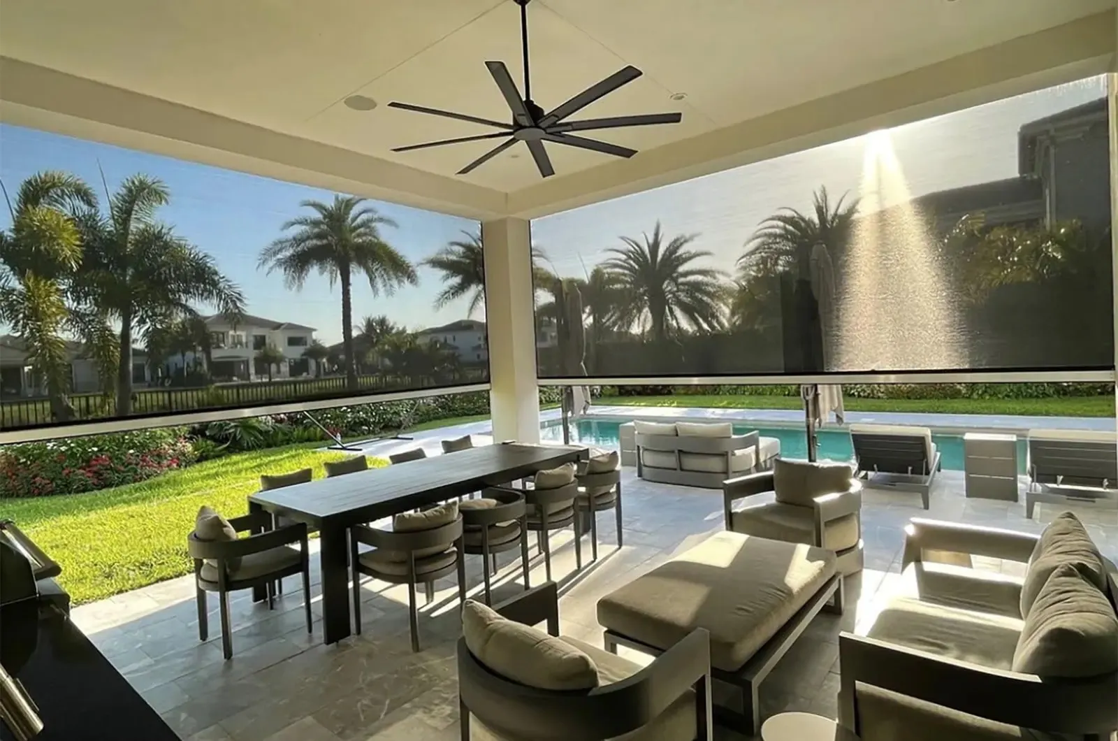 Residential retractable patio screen with outdoor fan – motorized screen for backyard outdoor living