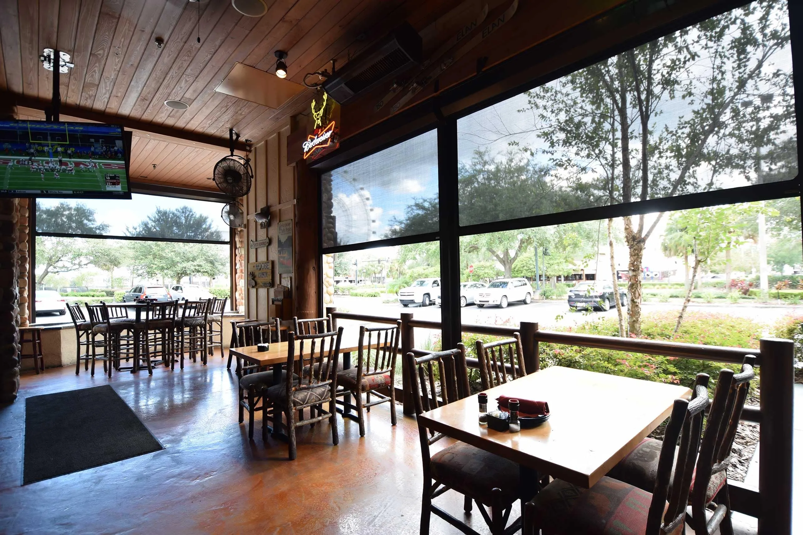 Go-Fenetex motorized insect protection screens for commercial restaurant outdoor dining patio